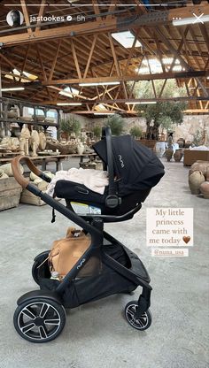 a baby stroller is in the middle of a store