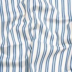 blue and white striped shirting with vertical stripes on the chest, as if it were folded up