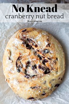 no knead cranberry nut bread on wax paper with text overlay that reads, no knead cranberry nut bread