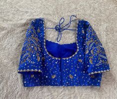 Hand embroidered ready made saree blouse / crop top/stitched saree blouse usa / blue  saree blouse/ hand embroidered blouse/zardosi blouse/orange saree blouse/ blue pure silk blouse/ maggam work blouse        It is very true that a perfect blouse is the one which makes your saree look stand out !! If you find one of such a style that you have been wanting to have then dont let it go !! we carry such unique trending blouses that instantly add a stylish look to any saree !!     Well..!! we underst Fitted Silk Saree With Handwork, Traditional Silk Tops With Handwork, Fitted Silk Top With Handwork, Silk Blouse Piece With Handwork Fitted, Fitted Silk Blouse Piece With Handwork, Fitted Dola Silk Top With Handwork, Royal Blue Resham Embroidery Fitted Choli, Fitted Silk Traditional Wear With Handwork, Fitted Royal Blue Choli With Resham Embroidery