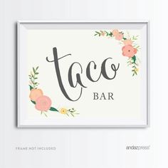 a sign that says taco bar with flowers and leaves on the front, in white frame