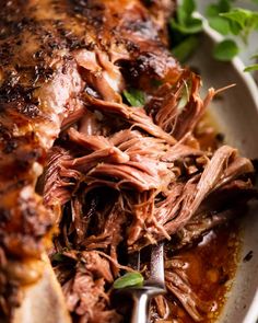 a close up of a plate of food with meat