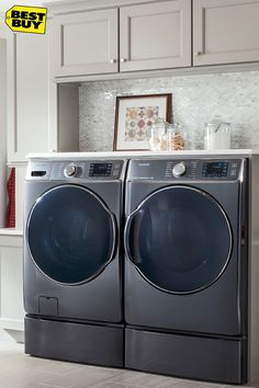 a washer and dryer in a kitchen