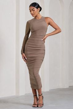 Elevate your wardrobe with our latest midi dress Luciene. This design comes in our signature stretch jersey with a mesh overlay and full body ruching - crafted to make you look and feel your best. Pair this one-sleeved staple with a pair of strappy heels for the ultimate going-out look. Features- Premium stretch jersey and mesh - Fully ruched- Bodycon fit- Sheer sleeve - Invisible zip closure- Split hemline- Midi length Sizing & FitModel is 5'8 and wears UK size 8 / US size 4 Product informationDesigned exclusively by Club L LondonDouble layered with some stretch Premium jersey and mesh in Mocha (95% Polyester, 5% Elastane)140cm total lengthSKU: CL128837038 Black Dress Prom, Black Tie Gala, Party Dress Long Sleeve, Bodycon Midi Dress, Black Sequin Dress, Black Velvet Dress, Mesh Overlay, Invisible Zip, Bodycon Midi