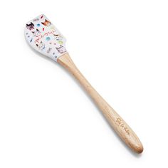 a white and wooden toothbrush with animals on it's brimmings