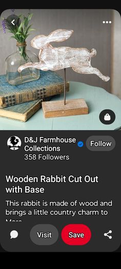 an image of a wooden rabbit cut out on top of a book and some books