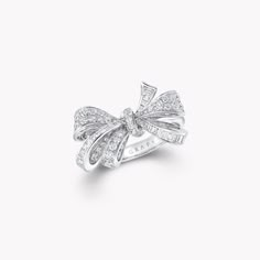 Discover the diamond bow ring depicting a lively bow motif from the Bow jewellery collection at Graff. Enter a world of perfection and beauty. Luxury Silver Jewelry With Bow, Luxury Silver Jewelry With Bow Detail, Luxury Diamond Bow Jewelry, Luxury Bow Jewelry For Anniversary, Elegant Diamond Jewelry With Bow Detail, Elegant Diamond Rings With Bow Detail, Diamond Ring With Bow For Gift, Diamond Bow Jewelry For Weddings, White Gold Bow Rings For Wedding