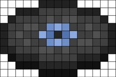 a black and white square with blue squares on it's side, in the middle is