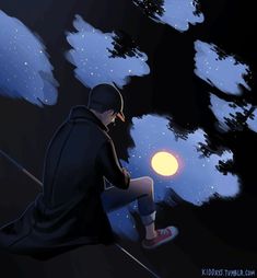 a person sitting on a ledge looking at the night sky