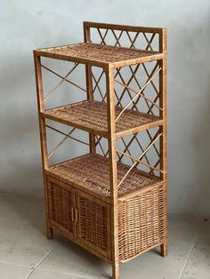 a wooden shelf with wicker baskets on top