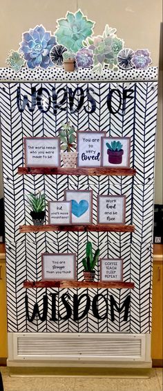 a bulletin board with some plants on it