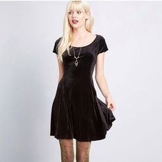 Modclotch X Fervour Velvet Vibes Solid Black Scoopneck Skater Dress In Size Small “Layer It Up Or Let It Shine On Its Own - Whatever Your Fashion Mood, This Black Velvet Skater Dress Will Spark A Feel-Good Day! Designed With A Scoop Neckline, Short Sleeves, Princess Seams, And A Subtle Flair To Its Skirt, This Modcloth-Exclusive Mini Makes Every Moment Marvelously Stylish.“ Shell: 90% Polyester, 10% Spandex. Contrast: 95% Rayon, 5% Spandex. Made In The United States No Trades/Holds. Teal Blue Dress, Velvet Skater Dress, Ruffle Wrap Dress, Let It Shine, Mod Cloth Dresses, Tropical Dress, Cotton Linen Dresses, Modcloth Dresses, Bow Detail Dress