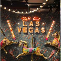 the las vegas carousel has been decorated with colorful lights and horses, as well as other decorations