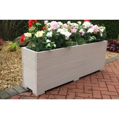 a planter box with flowers in it