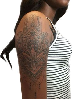 a woman with a tattoo on her arm