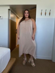 The Plus Size Tassel Tie Strap Midi Dress is a flowy midi dress that comes in taupe and black. This comfortable midi dress's lightweight fabric and simple tassel make this plus size midi dress ideal for vacations and brunches, The midi dress also comes with adjustable straps in the back! We recommend pairing this with any sandal or wedge that matches the color of the dress! 100% Rayon. Imported. Hand wash cold. Model pictured is wearing a 3XL. Flowy Beige Rayon Midi Dress, Tie Strap Midi Dress, Midi Dresss, Plus Size Midi Dress, Flowy Midi Dress, Tall Girl, Linen Shorts, Model Pictures, Dress 100