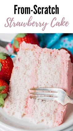 a slice of strawberry cake on a plate with a fork and strawberries in the background