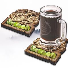 two coasters that have been designed to look like wood with green decorations on them