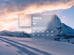 an image of a weather station in the middle of mountains with snow and clouds above it