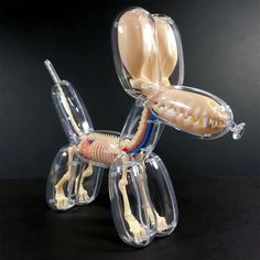 a toy dog made out of clear plastic