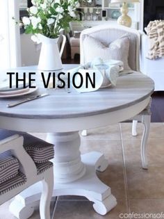 a white table with flowers on it and the words the vision overlayed in black