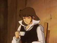 an anime character sitting at a table with a cup in his hand and another person standing next to him