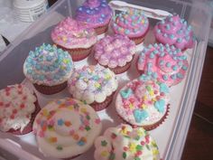 there are many cupcakes in the plastic container