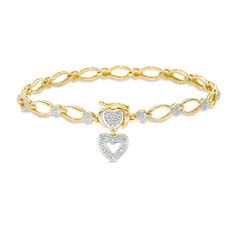 Dress her wrist with this charming bracelet for any special occasion. Crafted in sterling silver, this enchanting style features oval links plated in warm 14K gold alternating with heart-shaped stations adorned with diamond accents. At the clasp, a diamond-accented heart-shaped design and dangle heart charm complete this thoughtful look. Polished to a bright shine, this 7.25-inch bracelet secures with a box clasp. Tiffany Bracelet Silver, Look Polished, Gold And Silver Bracelets, Box Clasp, Diamond Bracelets, Heart Charm Bracelet, Bracelet Designs, Silver Bracelets, Sterling Silver Bracelets