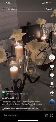 an image of a table with candles and flowers on it in the app for iphone