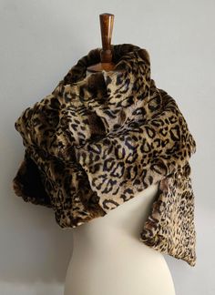 Glamorous Leopard Print Faux Fur Wrap Luxuriously large plush scarf consciously crafted in faux fur leopard print with black fabric lining. Measures 16 inches wide and and 68 inches long! SHIPPING INFORMATION FLAT USPS Priority Mail shipping rate of $12.95 to anywhere in the United States. Worldwide shipping via eBay's Global Shipping Program. International buyers are responsible for any import duties or taxes. Thanks for shopping with us! Faux Fur Wrap, Fur Wrap, Big Cats, Black Fabric, Soft Plush, Diy Clothes, Winter Coat, Priority Mail, Fall Colors