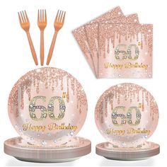 a set of pink and gold birthday party supplies with sparkles on the plates, forks and napkins