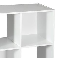 a white shelf with three shelves on one side and two smaller ones on the other