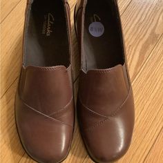 Brand New Clark’s Women’s Shoes In A Brown/ Black Color. Never Worn. Pet Free,Smoke Free Home Clark’s Outfit Women, Clarks Brookleigh Mule, Medium Width Cushioned Leather Slip-on Shoes, A Beaut Clark Shirt, Clark’s Wallabies, Womens Clarks, Clarks Women's, Clarks Shoes, Black Color