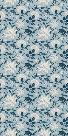 a blue and white wallpaper with flowers on it