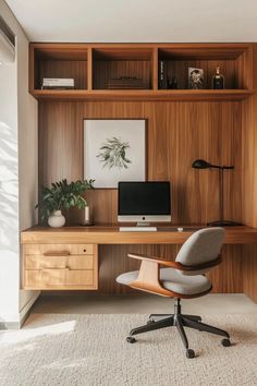 a desk with a computer on it in front of a wooden bookcase and shelves