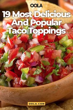 a wooden bowl filled with salsa and tortilla chips on top of a table