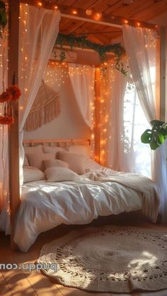 a bed with white sheets and lights on it