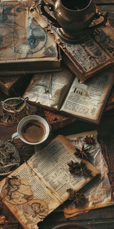 an old book and cup of coffee on a wooden table with other items around it