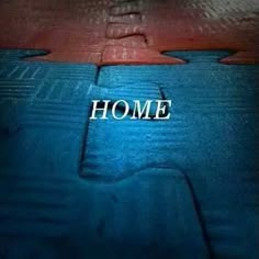 the word home is written on top of a mattress