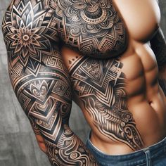 a man with tattoos on his arm and chest