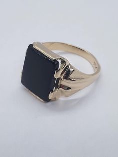 This elegant, classic, onyx ring has been carefully handcrafted in warm 10K yellow gold and authentic onyx. This impressive ring will make a beatiful birthday/any ocassion gift. Upon request a personalized message can be added to the inside of the ring at no extra charge. Once ring has been shipped a tracking number will be provided to you.   Ring is size 9 3/4 but can be resized at no extra cost and it will be shipped to you in an elegant gift box. Ring weight: 4.7 grams Face of the ring is: 14 Gold Onyx Ring, Onyx Ring Men, Rings Men, Men Rings, Box Ring, Signet Rings, Ring Men, Onyx Ring, Have A Blessed Day