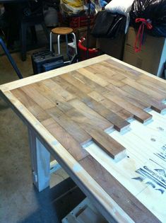 the table is being made with wood planks