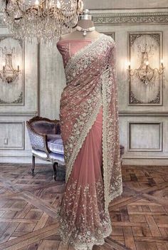 Beautiful dull peach pink net saree with zari and stone work and running blouse piece Purple Net Saree, Pink Net Saree, Glitter Falling, Avani's Outfits, Saree Blouse Styles, Fancy Sarees Party Wear, Mauve Purple, Net Saree, Wedding Saree