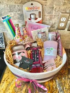 a basket filled with personal care items on top of a counter