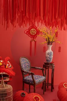 a red room with chinese decorations and chairs