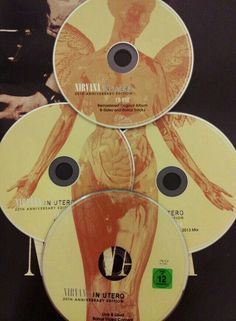 three dvds are stacked on top of each other in front of a black background with an image of a woman's torso