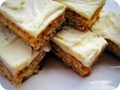 several pieces of cake sitting on top of a white plate