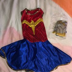 Includes: Dress, Belt, Tiara, Gauntlets, Armband Batman Costume For Girls, Batgirl Halloween Costume, Batgirl Halloween, Dc Wonder Woman, Wonder Woman Halloween Costume, Batman Girl, Superman Boy, Wonder Woman Shirt Toddler, Supergirl Costume