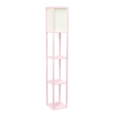 a pink shelving unit stands against a white background with a light colored shelf in the middle