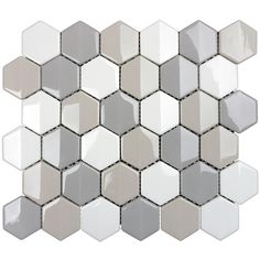 a white and gray hexagonal tile pattern on a white background with grey accents